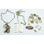 Two silver ingot pendants and chains, an Egyptian silver pendant with gold inlay, a Mizpah brooch,