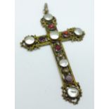 An Austro-Hungarian blister pearl and garnet cross pendant set in gilded white metal (tests as