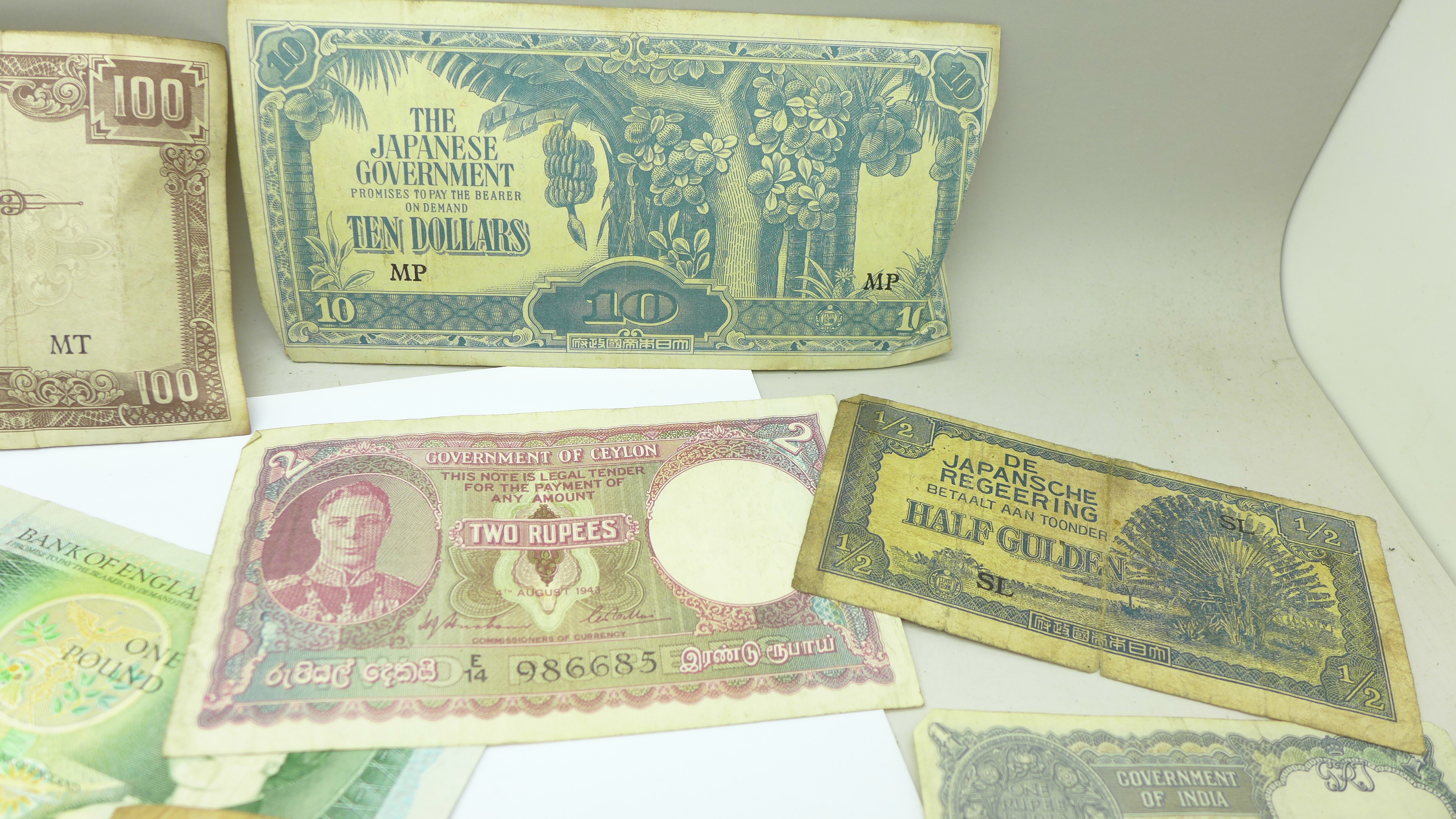 A collection of sixpences and foreign banknotes - Image 4 of 4