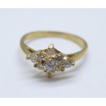 A 9ct gold cluster ring, 2.3g, P, one stone replaced