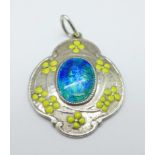 A Murrle Bennett Art Nouveau pendant, with blue green enamel panel and yellow enamel flowers, also