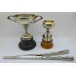 Two silver trophies with inscriptions and a pair of silver handled glove stretchers, (silver 98g)