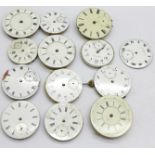 Assorted pocket watch movements and dials