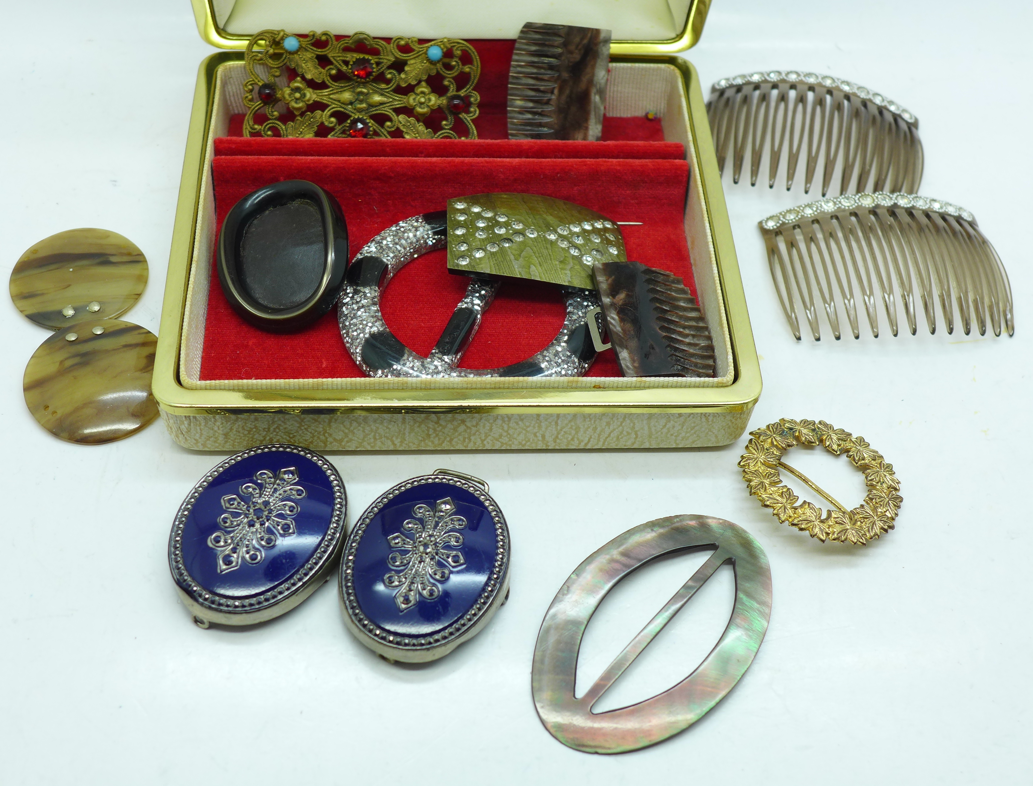 Buckles including mother of pearl and two hairslides