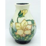 A Moorcroft vase, 13.5cm, dated 1999, first quality