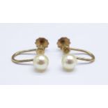 A pair of 9ct gold and pearl earrings, 1.2g, screw backs