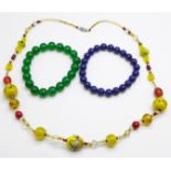 A Murano 'lamp work' glass bead necklace and two bead bracelets