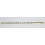 A 9ct gold, emerald and diamond bracelet, 7.1g