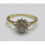 A 9ct gold, diamond cluster ring, 1.6g, N