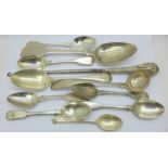 A collection of silver spoons, mainly 19th Century, 301g, and a silver handled button hook