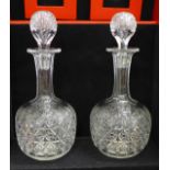 A pair of lead crystal cut glass decanters, boxed