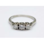 A platinum set, three stone diamond ring, 3g, N