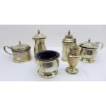 Silver condiments;- a three piece set, a mustard and pepper by Mappin & Webb and a pepperette, 235g