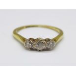 An 18ct gold and three stone diamond ring, 2.2g, P