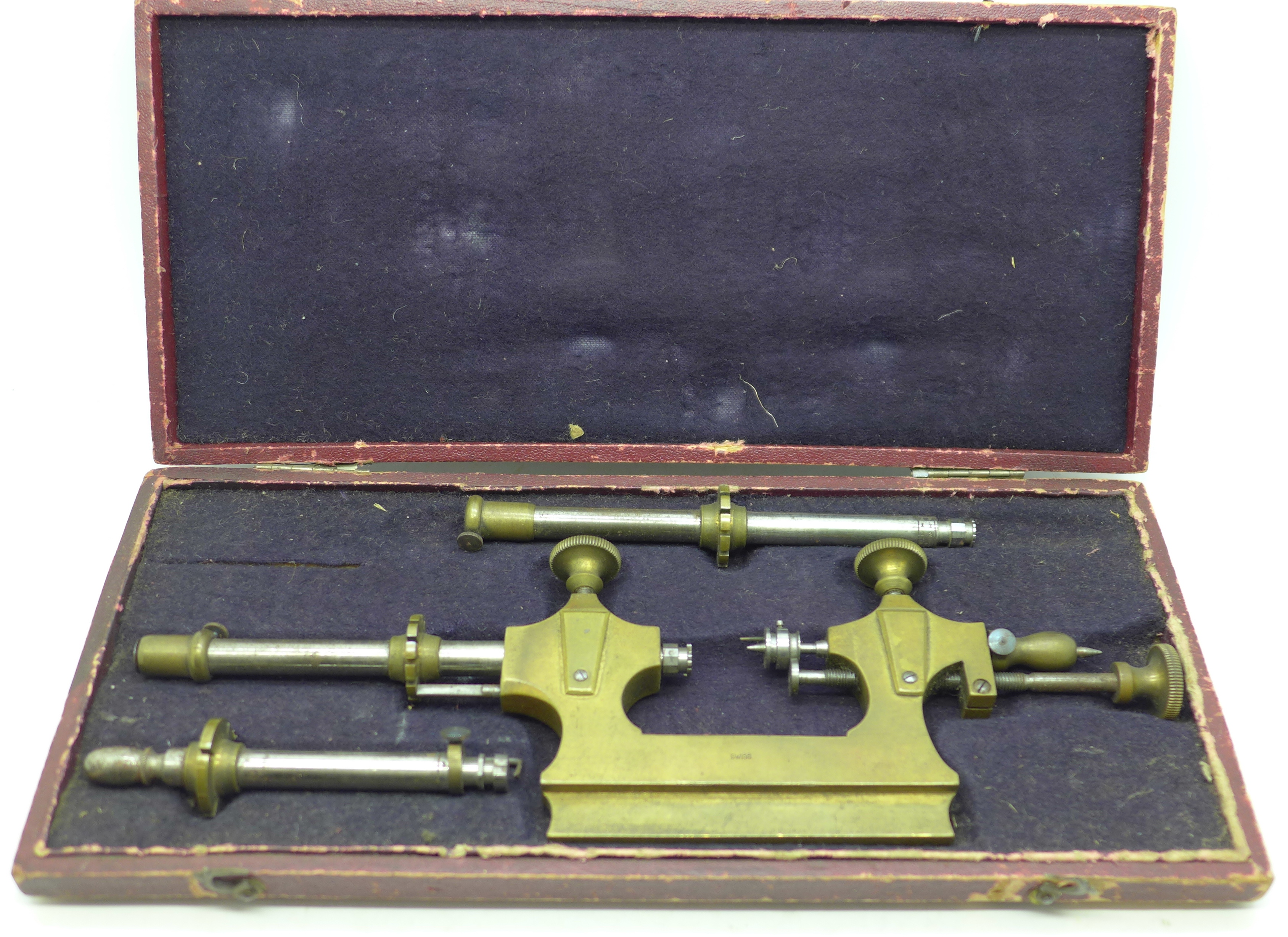 A watchmaker's lathe tool, cased