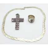 A silver necklace, a ring and a cross pendant lacking one marcasite