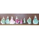 Eight Royal Doulton figures including a Gentleman from Williamsburg, Vanity, Fair Lady, Michelle and