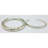 A hammered 925 silver bangle and a hallmarked silver bangle bearing inscription, 68g