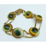A 9ct gold and cat's eye shell bracelet, total weight 21.2g