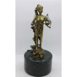 A figure of a huntress on an onyx base, 20.5cm