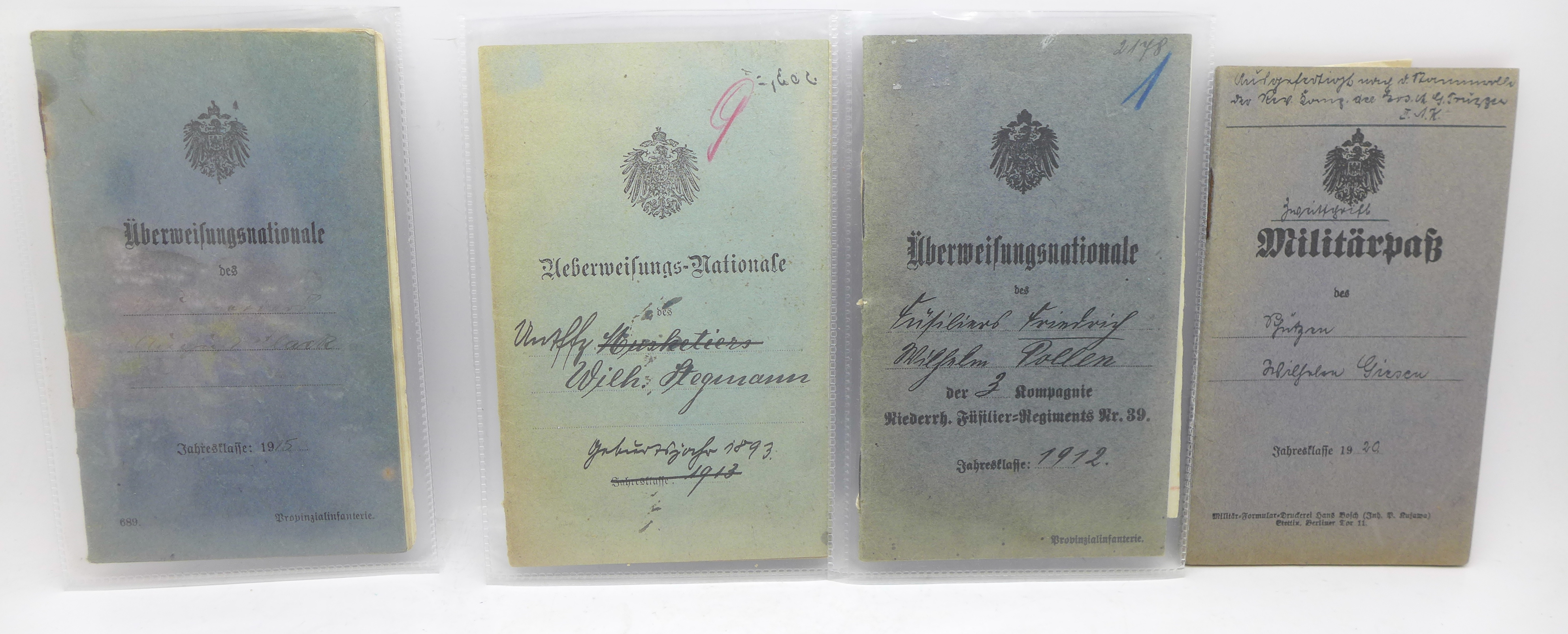 WWI German passbooks, (4), one with a prisoner record