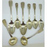 A pair of Victorian silver ladles and six assorted silver spoons including Georgian, 430g