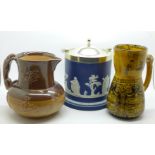 Two Doulton jugs, Jacobean and saltglaze and an Adams jasper biscuit barrel