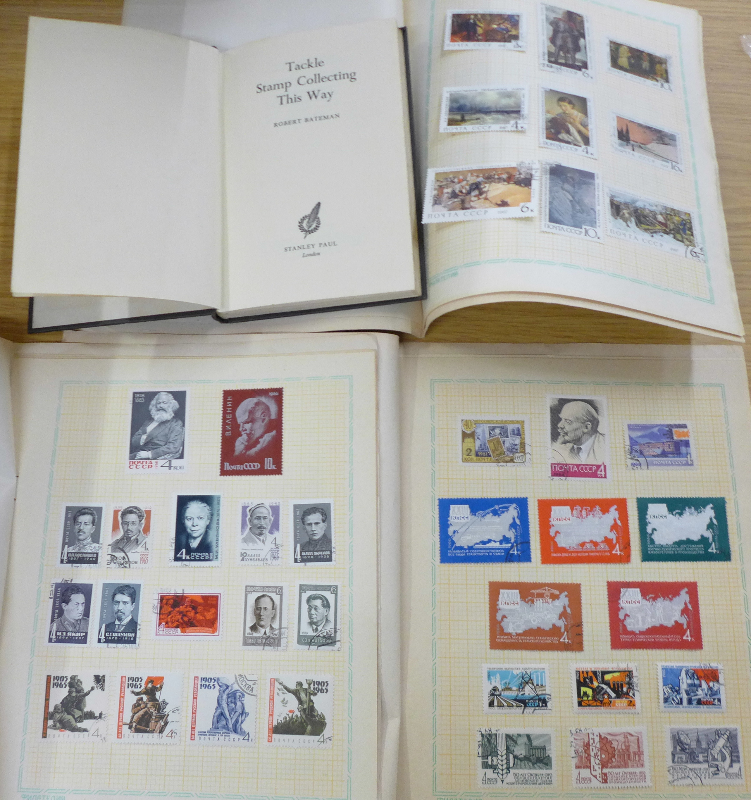 Three booklets of Russian stamps and a stamp collecting book