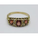 A 9ct gold, red and white stone ring, 2g, Q