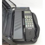 A 1980's Nokia mobile phone with case