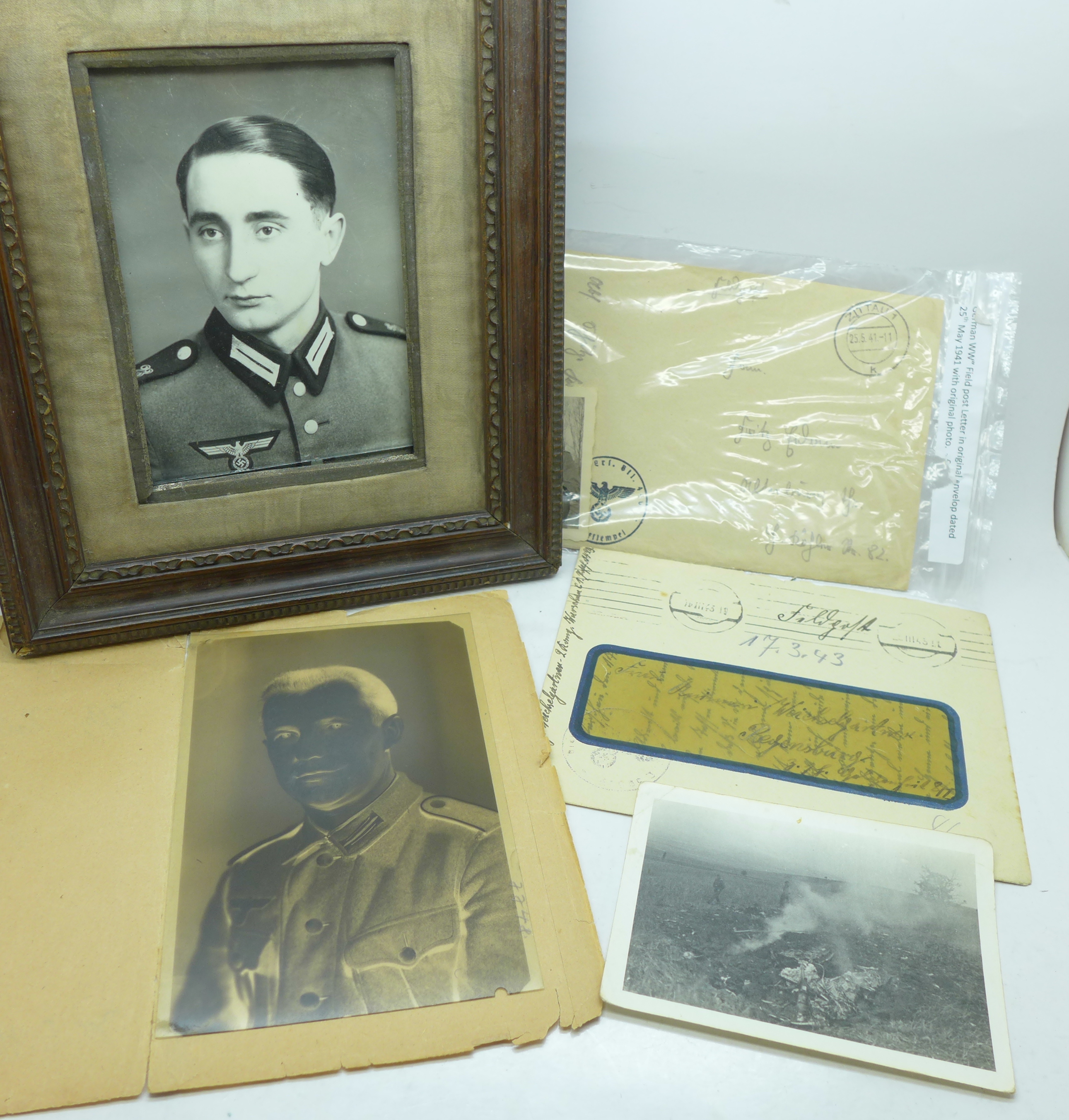 Letters, photographs, a negative of a WWII soldier and a framed photograph