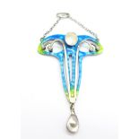 An Art Nouveau enamel, blister pearl and seed pearl pendant, 31mm wide