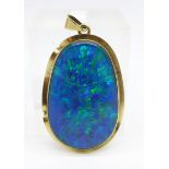 A yellow metal mounted doublet opal pendant, a/f cracked, opal 34mm x 21mm