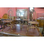 A set of four elm and beech Windsor kitchen chairs