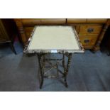 A Victorian bamboo occasional table