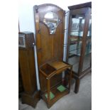 An Art Deco oak hallstand