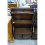 An Ercol Golden Dawn open bookcase