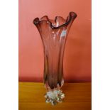 An amethyst glass vase, 41cms h