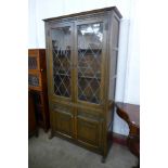 An Old Charm carved oak bookcase