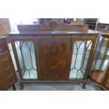 A mahogany display cabinet