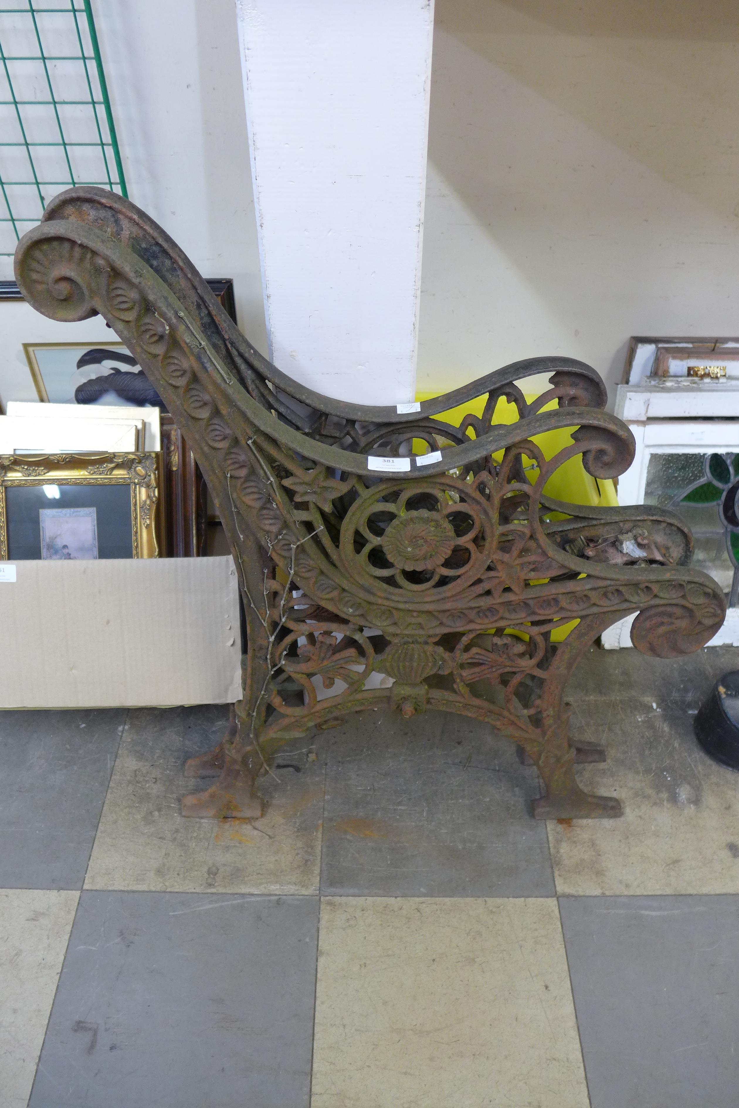 A pair of cast iron bench ends