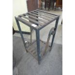 A wrought iron plant stand
