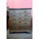 A George III oak chest of drawers, 111cms h, 101cms w, 52cms d