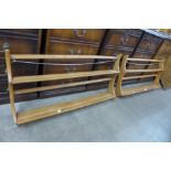 A pair of Ercol Blonde wall hanging shelves