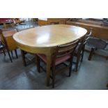 A Nathan teak dining table and four chairs