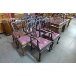 A set of eight Chippendale Revival carved mahogany dining chairs