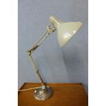 A metal anglepoise desk lamp