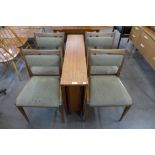 A teak drop-leaf table and four chairs