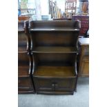 An Ercol Golden Dawn open bookcase