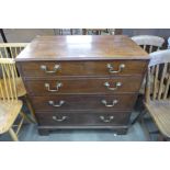 A George III mahogany chest of drawers, with lift up top